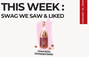 Text above reads "This Week: Swag We Saw and Liked." Below an image of the Sweet Spritz Champagne Bottle filled with nerd gummy clusters