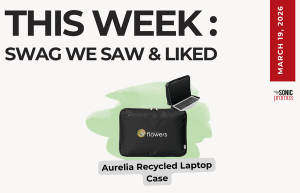 Text above reads "This Week: Swag We Saw and Liked." Below is a picture of an Aurelia recycled laptop case shown opened and closed