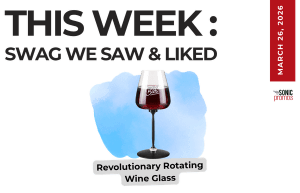 Text above reads "This Week: Swag We Saw and Liked." Below is an image of the Revolutionary Rotating Wine Glass