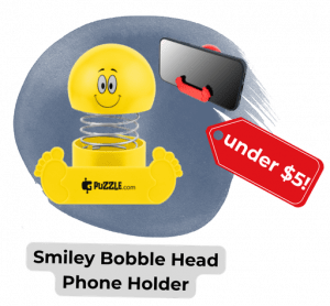 Smiley Bobble Head Phone Holder with red tag saying Under ! next to it