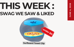 Graphic announcing this week’s swag: two surfboard towel clips (blue shark and yellow aloha) with a red 'under ' tag; sale date on right.
