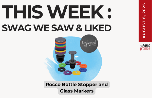 This week: Swag we saw & liked — featuring the Rocco Bottle Stopper and Glass Markers on a blue backdrop.
