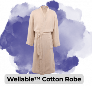 swag we saw and liked 813 10 - Sonic Promos | Custom Promotional Items Beige cotton robe with belt and pockets on a purple background; product name Wellable™ Cotton Robe.