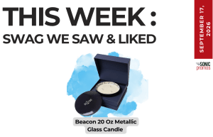 Promo banner announcing this week’s swag with an open blue gift box candle: Beacon 20 oz Metallic Glass Candle, blue splash background, date badge September 17, 2026.
